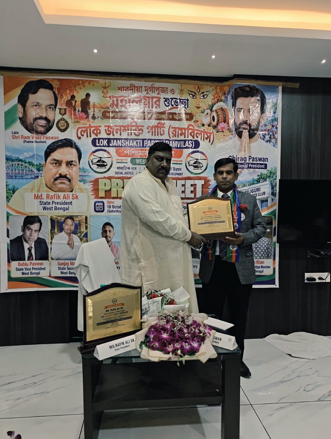 Party workers at a community welfare event